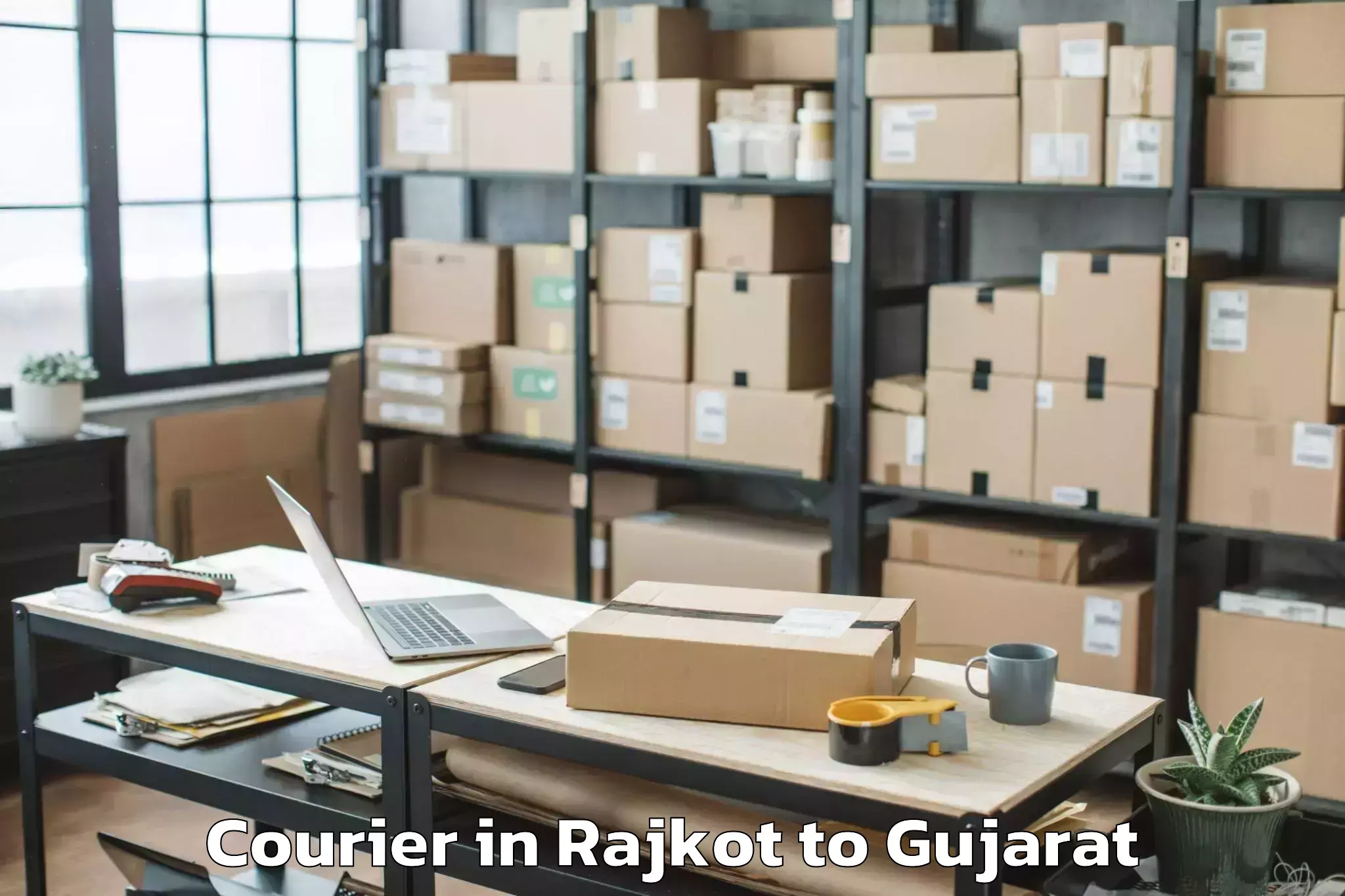 Get Rajkot to Institute Of Advanced Research Courier